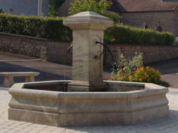 Hand carved octagonal limestone pool fountain